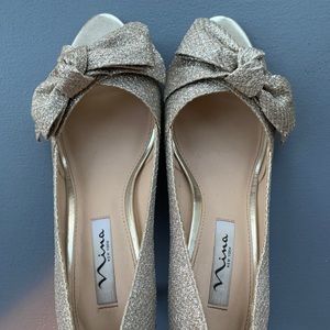 Nina peep toe champagne pumps